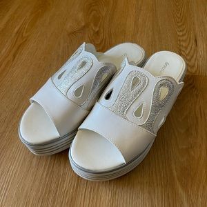 White platfrom slippers. Good as brand new